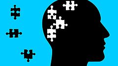 Kopf mit Puzzleteilen